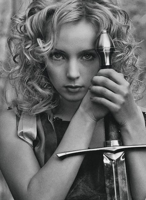 Giovane donna con spada: simbolo del potere femminile nell'aristocrazia franca medievale e della sua influenza politica.