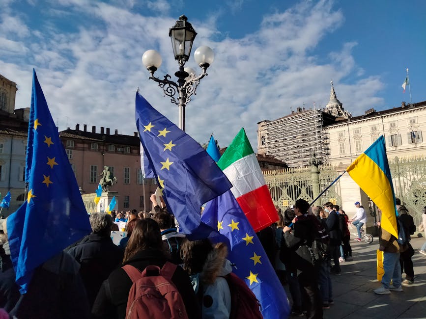 Manifestazione con bandiere europee, italiane e ucraine a Torino per l'educazione civica e la cittadinanza attiva nei progetti europei