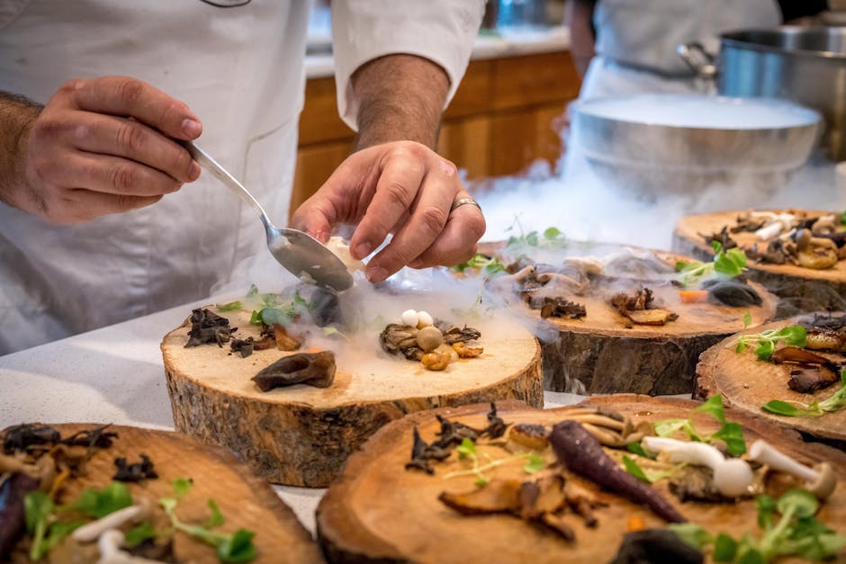 Chef prepara piatto molecolare con funghi e azoto liquido per esperienza unica in laboratori di biologia per studenti