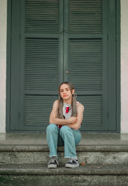Ragazza seduta sui gradini: conversione da chilogrammi a libbre spiegata facilmente nell'articolo