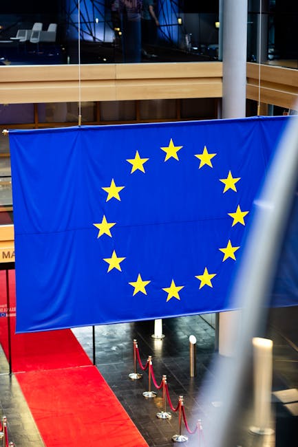 Bandiera dell'Unione Europea al Parlamento europeo dopo la sospensione dell'AI per sicurezza dei legislatori europei