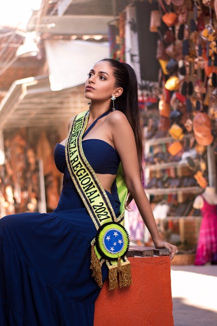 Miss Bellezza Regionale 2021 seduta, sguardo rivolto verso l'alto. Immagine evocativa per disparità graduatorie concorsi ordinari e PNRR