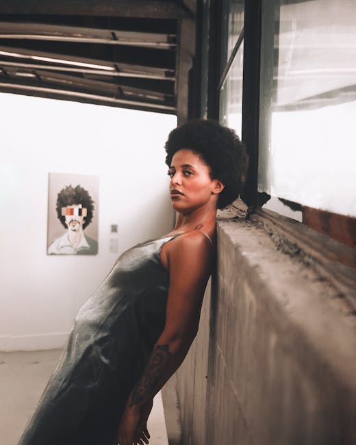 Ritratto di una giovane scienziata afroamericana che incarna l'eccellenza femminile nella scienza e la sua importanza per l'11 febbraio.