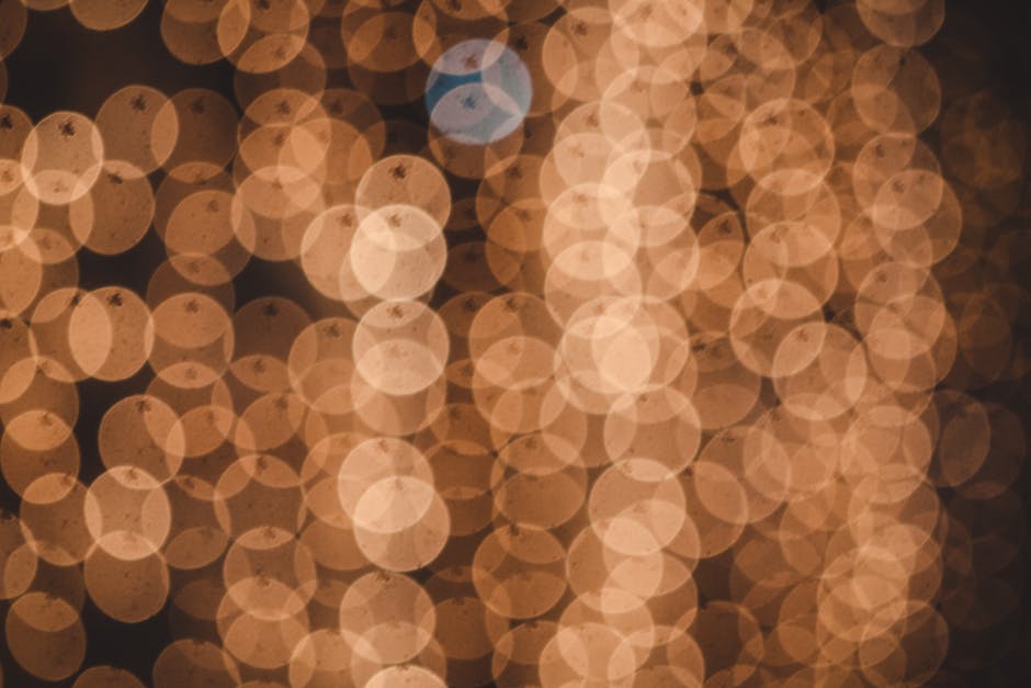 Cerchi luminosi sfocati che ricordano le formule geometriche del cerchio, illustrando la magia della geometria e le sue applicazioni.