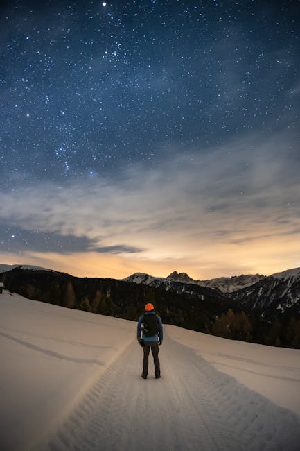 Studente guarda il cielo stellato: metafora per le opportunità del bando Filiera 4+2 per le scuole italiane e il futuro.