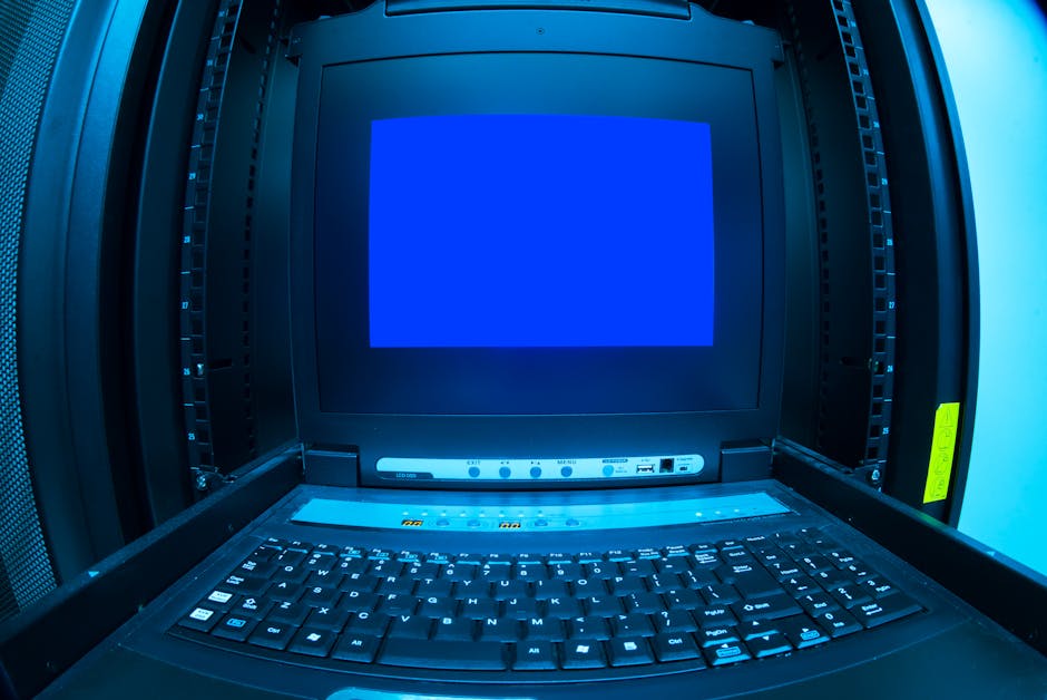 Server rack con monitor blu e tastiera, simbolo di gestione dati e crescita professionale sostenibile nell'IT moderno.