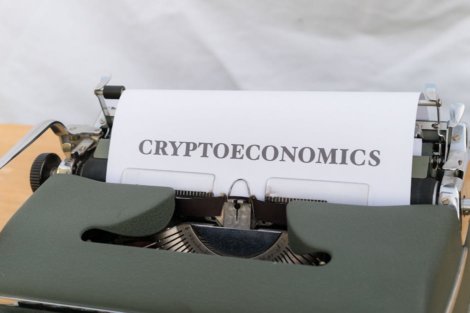 Rinnovo contratti scuola: macchina da scrivere con la parola 'Cryptoeconomics', implicazioni economiche degli aumenti ARAN per il personale scolastico.