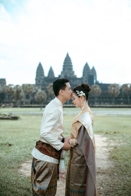 Ministri illuminati: un'immagine di armonia e rispetto, come un matrimonio cambogiano con Angkor Wat sullo sfondo, per una scuola ideale.