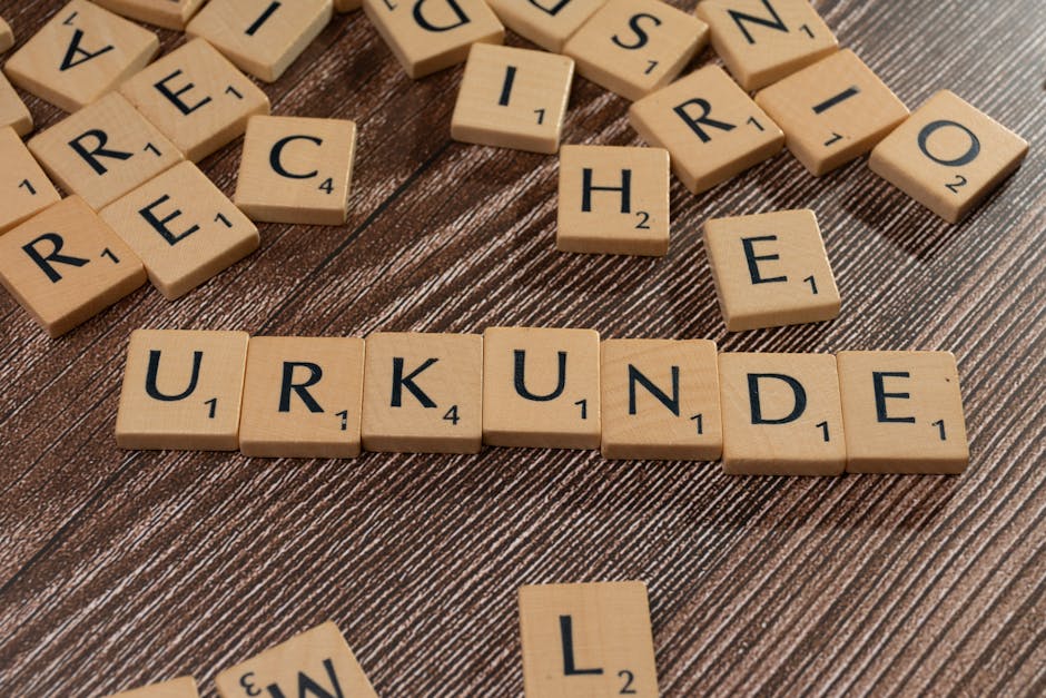 Certificazione linguistica e punteggio GPS 2026: tessere con la parola Urkunde, simbolo dell'importanza delle certificazioni.