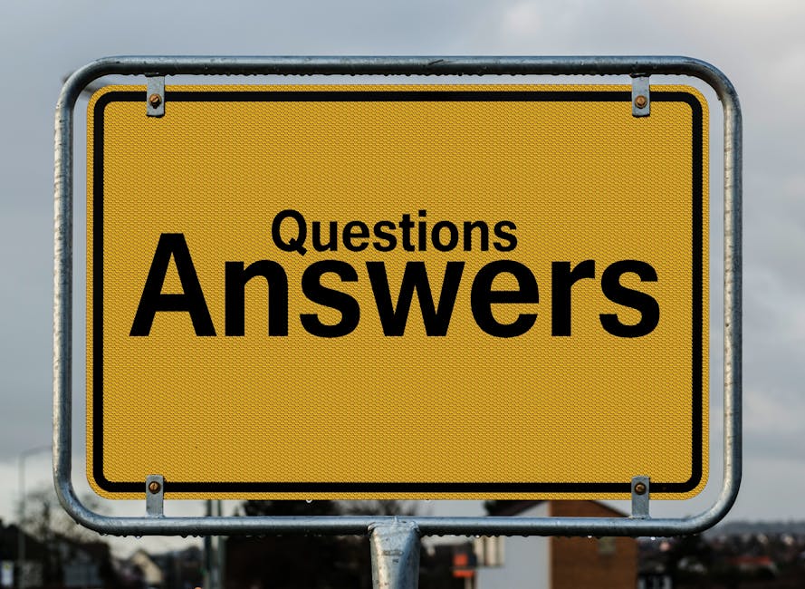 Cartello stradale con le parole Questions Answers. Immagine concettuale per GPS 2026: risposte ai quesiti e tabelle titoli.