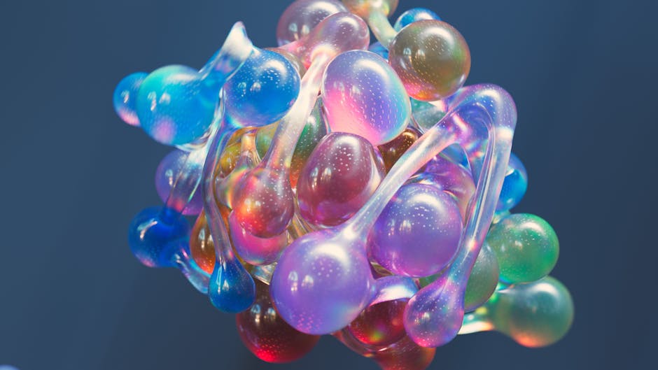 Rappresentazione astratta di forme sferiche iridescenti multicolore, evocativa della scomposizione della realtà tipica degli artisti cubisti.