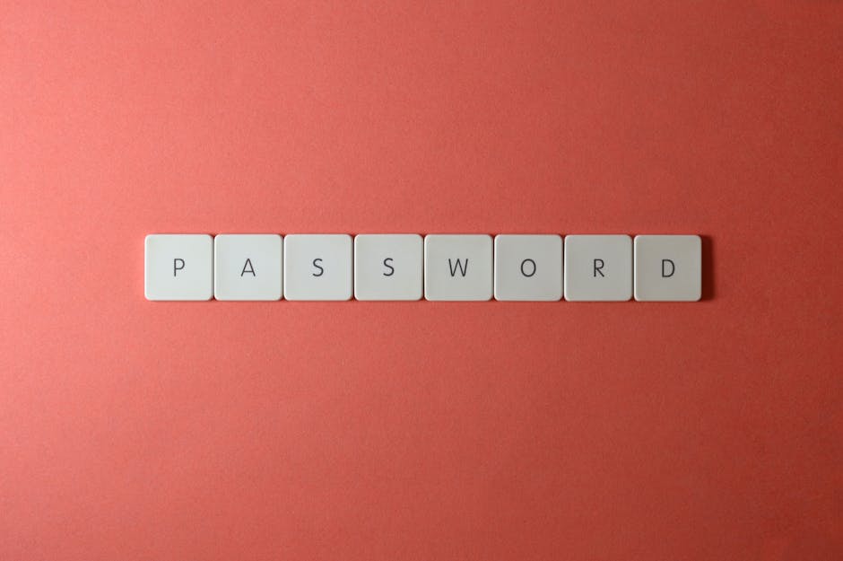 Password scritta con tessere su sfondo rosso, sicurezza credenziali NoiPA e protezione account personali online.