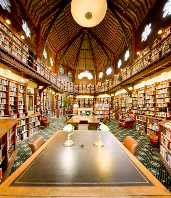 Biblioteca storica con tavoli studio e scaffali pieni di libri, ambiente ideale per la preparazione delle elezioni delle Consulte Studentesche
