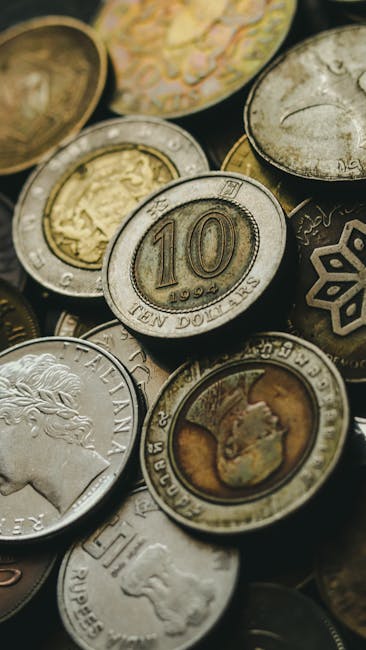 Monete internazionali diverse valute e paesi simbolo del ruolo del Fondo Monetario Internazionale nell'economia globale