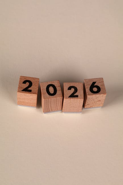 Blocchi di legno con il numero 2026 che simboleggiano i cambiamenti nei programmi scolastici italiani dal 2026. Nuove indicazioni nazionali.