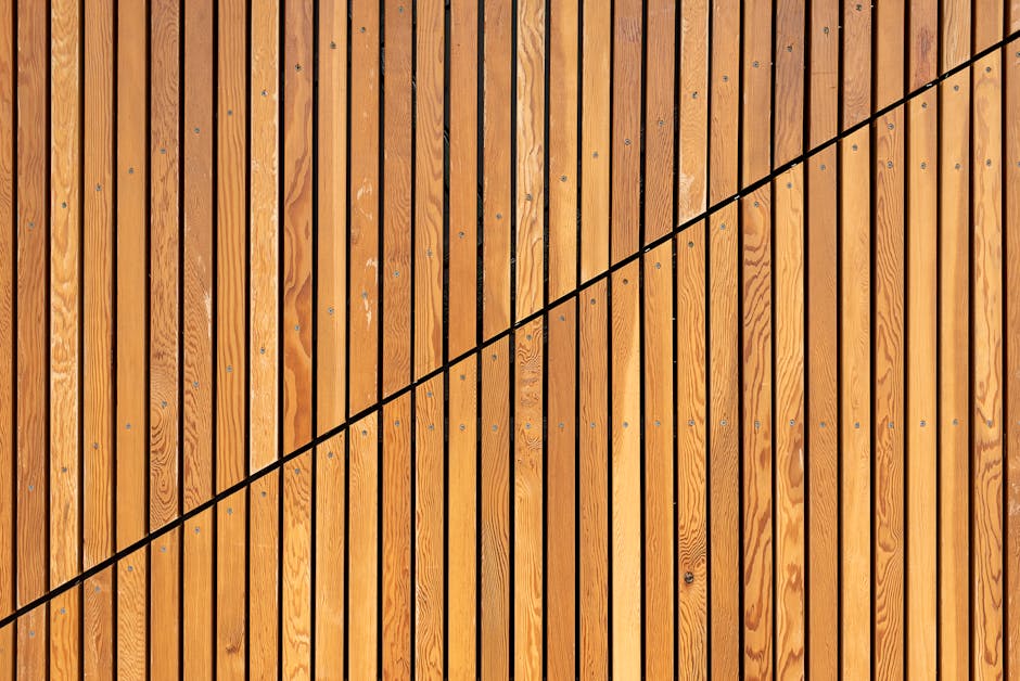 Rette parallele in legno tagliate da una trasversale nera, esempio visivo per l'articolo sui teoremi geometrici e angoli formati.