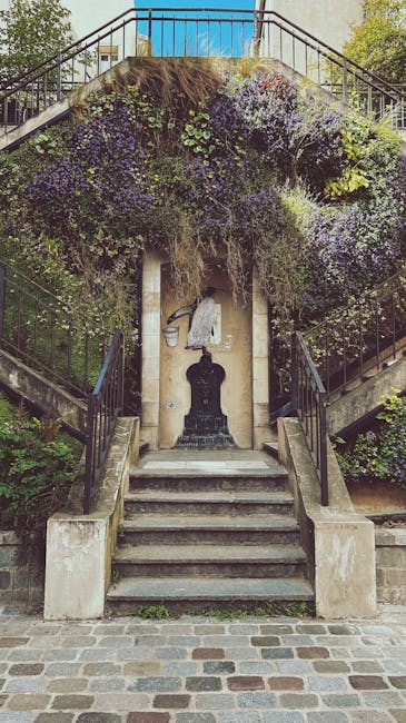 Scalinata verdeggiante con fontana a Parigi, un'oasi urbana che evoca la ricerca di vita in ambienti inaspettati nel cosmo.