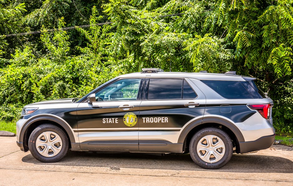 Auto della Polizia di Stato americana, simbolo di sicurezza e prevenzione, parte integrante dei percorsi di prevenzione nelle scuole.