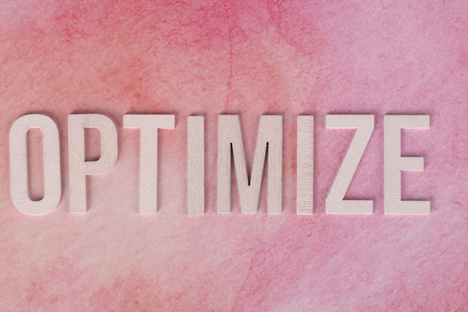 Ottimizzazione del ruolo Main nel marketing: parola Optimize su sfondo rosa per strategie efficaci e risultati misurabili.