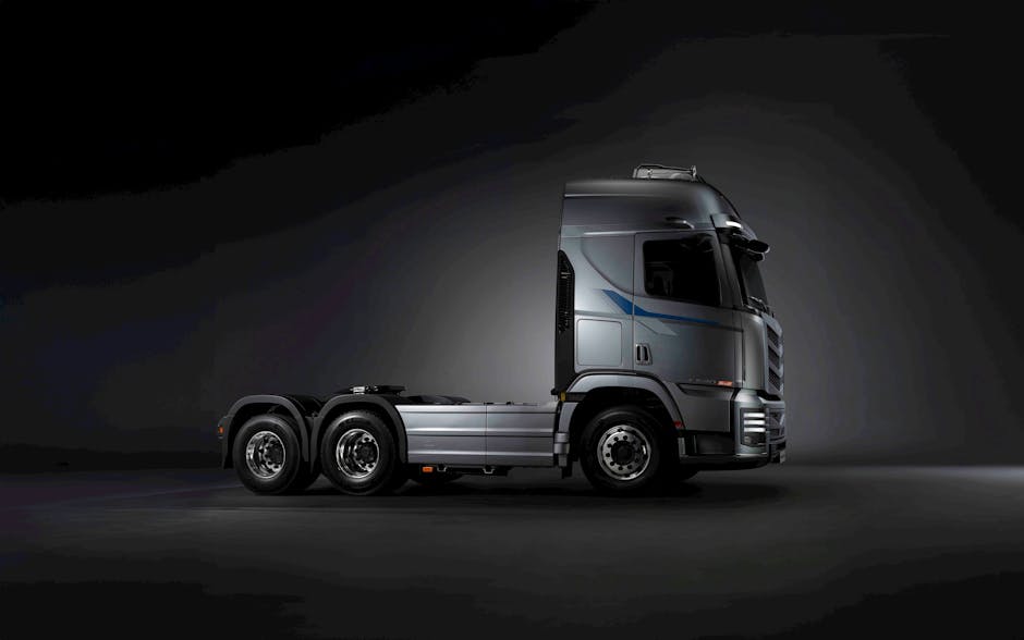 Camion moderno su sfondo scuro, simbolo di cambiamento e mobilità nel settore dei trasporti, legato alla Legge di Bilancio 2026