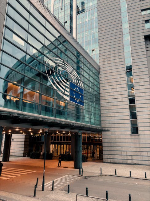 Palazzo del Parlamento Europeo a Bruxelles, simbolo dello scontro Ue-Meta sulle politiche AI di WhatsApp e la regolamentazione tecnologica