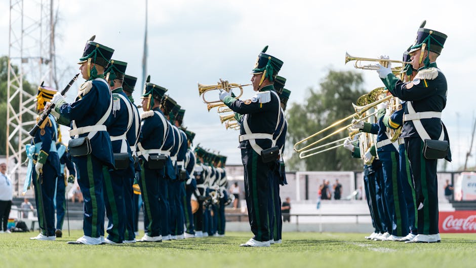 Banda musicale in divisa esegue brani musicali, possibile riferimento a graduatorie GPS 2026 e aggiornamenti del 30 giugno per la prima fascia.