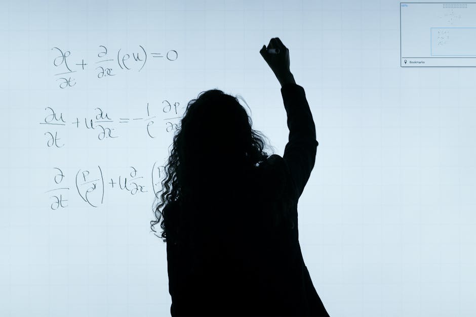 Insegnante scrive equazioni matematiche alla lavagna: metafora delle difficoltà burocratiche e incertezze della Carta docente 2025/2026