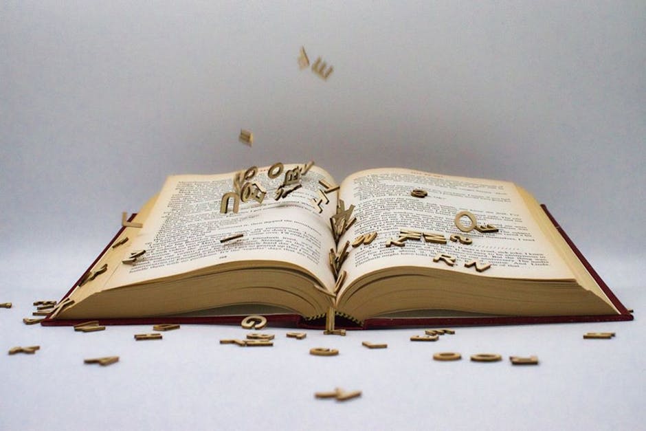 Libro aperto con lettere che fluttuano, metafora del rinnovamento dell'istruzione e dell'appello al ministro Bernini per un cambiamento educativo.