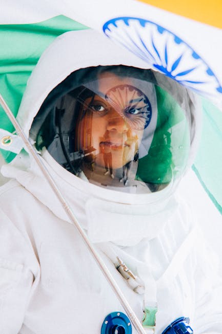 Studentessa di Ca' Foscari Treviso in tuta spaziale con bandiera indiana, simbolo di ambizione e innovazione universitaria
