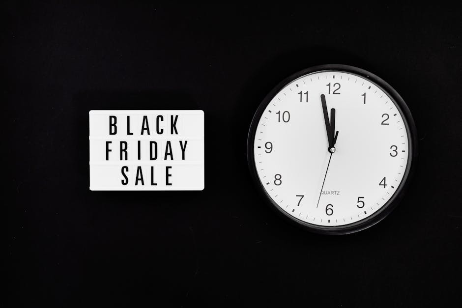 Orologio che segna l'ora del Black Friday con scritta luminosa 'Black Friday Sale', metafora del tempo che stringe per i docenti