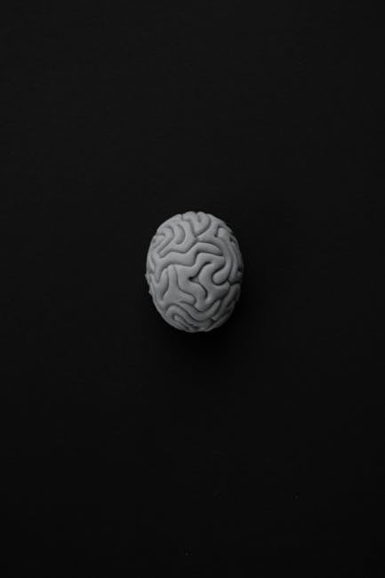 Cervello stilizzato su sfondo nero per articolo su filosofia, scienza e armonia interiore. Metafora di pensiero e equilibrio mentale.