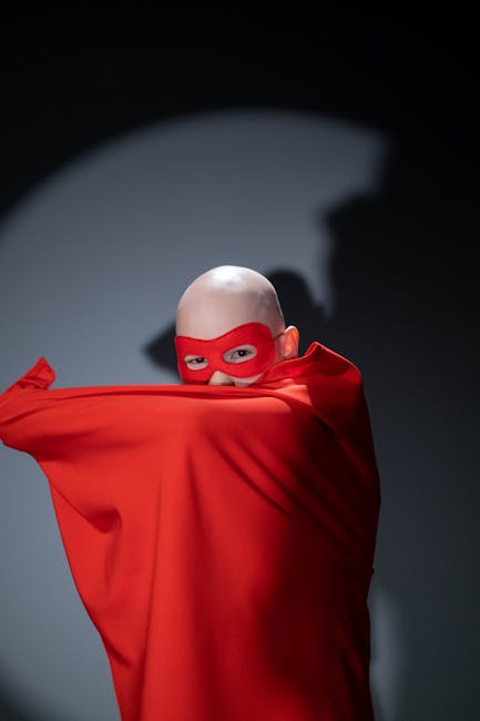 Persona con mantello rosso e maschera che ricorda il potere di calcolo e le funzionalità emergenti delle calcolatrici.