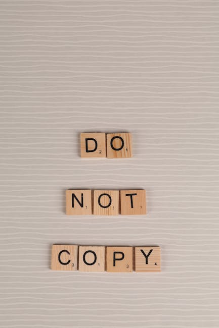 Orientamento universitario e proprietà intellettuale: blocchi di legno compongono la frase Do Not Copy, un avvertimento per gli studenti.