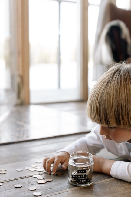Bambino che risparmia per il futuro: un investimento per le famiglie nel 2026 con la nuova manovra finanziaria e la riduzione IRPEF.