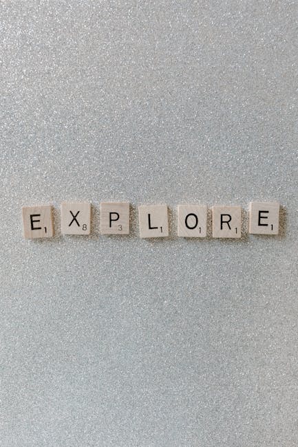 Esplorare nuove metodologie didattiche con la stampa 4D: parola 'Explore' su sfondo glitterato, simbolo di innovazione nell'istruzione.