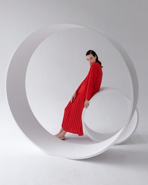 Donna in abito rosso seduta su cerchi bianchi, illustrazione visiva delle formule geometriche del cerchio e della sua comprensione.