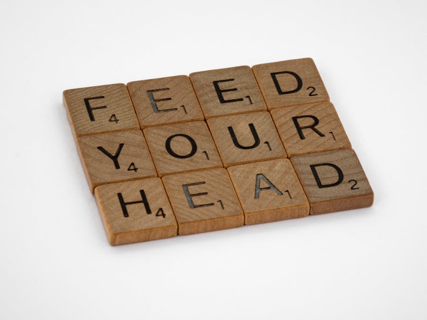 Tessere di Scrabble che compongono la frase Feed Your Head, metafora dell'importanza della ripetizione nell'apprendimento dell'inglese.