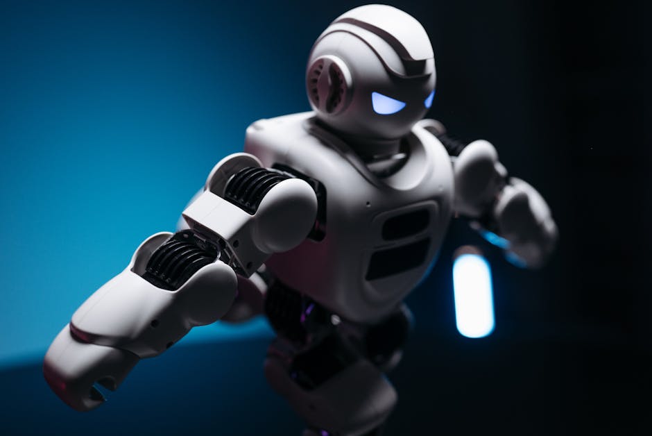 Robot umanoide bianco con occhi illuminati, esempio di progettazione elettrica avanzata e resistenza elettrica unica.