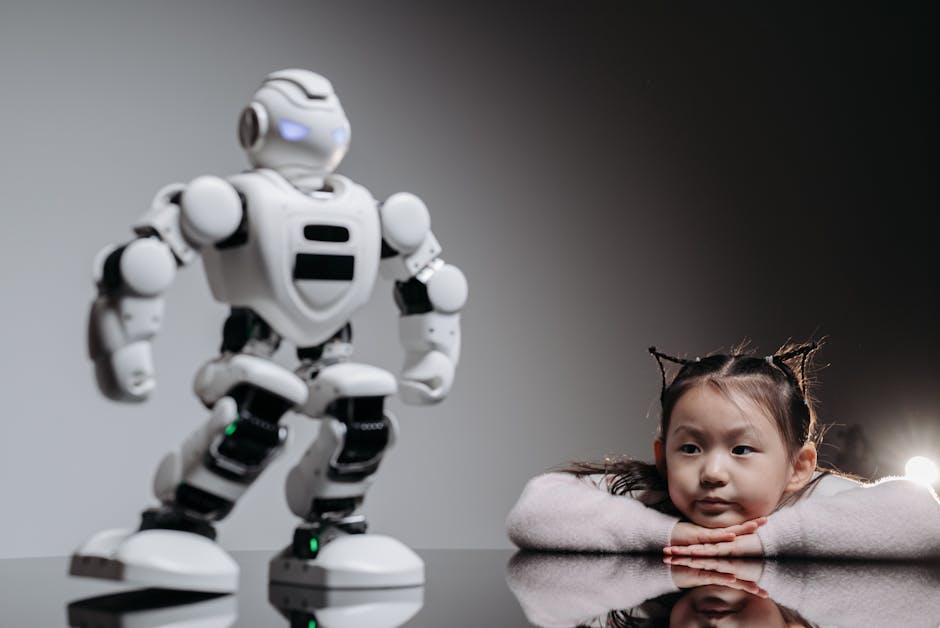 Bambina asiatica osserva un robot umanoide bianco: introduzione della robotica nell'istruzione e futuro dell'apprendimento interattivo.