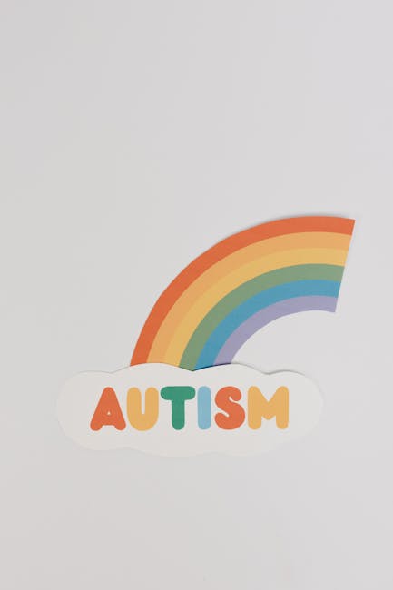 Illustrazione colorata con arcobaleno e la parola Autismo, simbolo di inclusione e supporto per lo sviluppo sano del bambino.