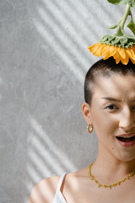 Donna con girasole in testa che esprime unicità, metafora del profilo di funzionamento unico per la crescita personale e professionale.