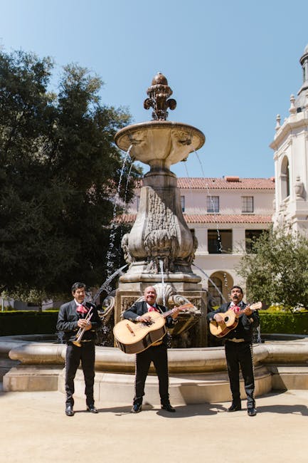 Mariachi suonano musica tradizionale a una fontana, un viaggio musicale quotidiano pieno di allegria e divertimento.