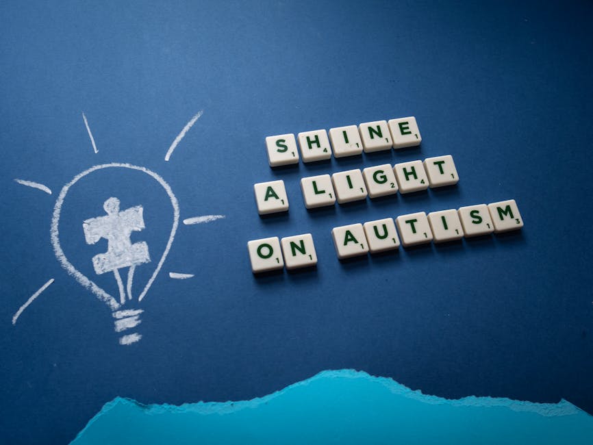 Comunicazione Aumentativa: lampadina con puzzle, scritta Shine a Light on Autism per inclusione sociale e supporto all'autismo