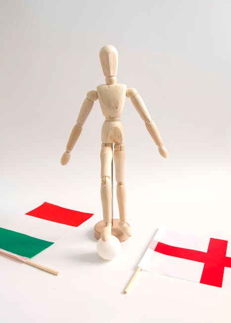 Bruno Giordano e il calcio internazionale: manichino con bandiere di Italia e Inghilterra che simboleggia l'eccellenza nel calcio.