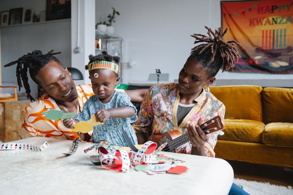 Famiglia afroamericana celebra la Giornata della Terra con attività creative e musicali, promuovendo la consapevolezza ambientale e il divertimento insieme.