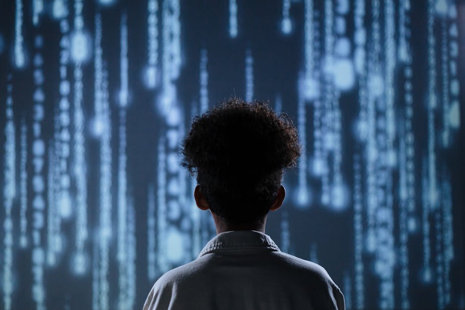 Studente di spalle osserva codice binario luminoso, intelligenza artificiale e futuro dell'apprendimento nell'istruzione moderna.