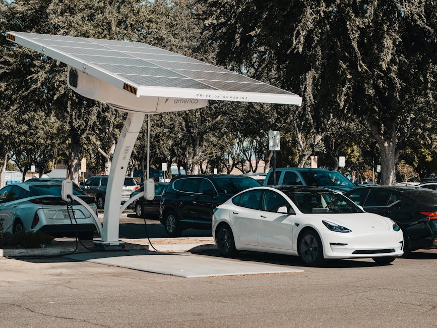 Stazione di ricarica solare per auto elettriche Tesla, energia pulita e progresso tecnologico per un futuro sostenibile e innovativo.
